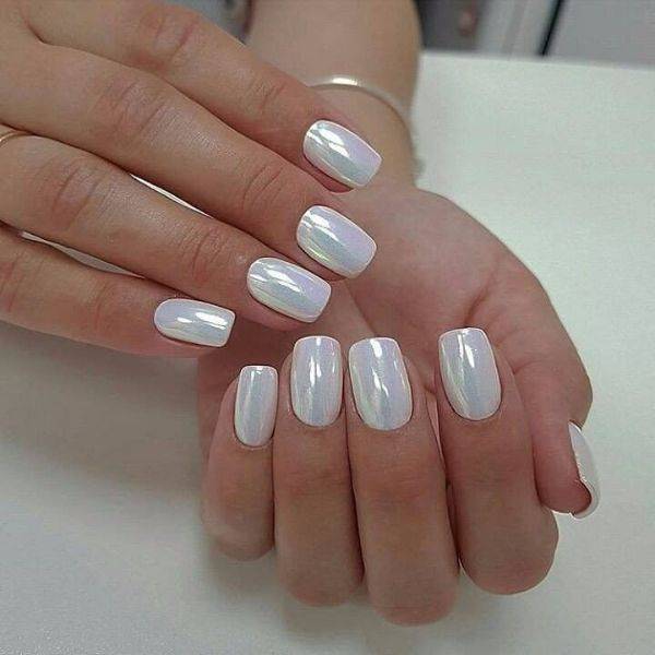 White Gel Nails with Chrome Accents
