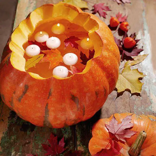 Floating Candles in Pumpkin Vases