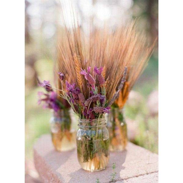 Boho Mason Jar with Feathers and Wildflowers