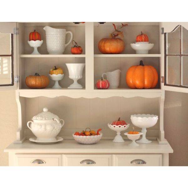 Glass Pumpkins on Kitchen Shelves