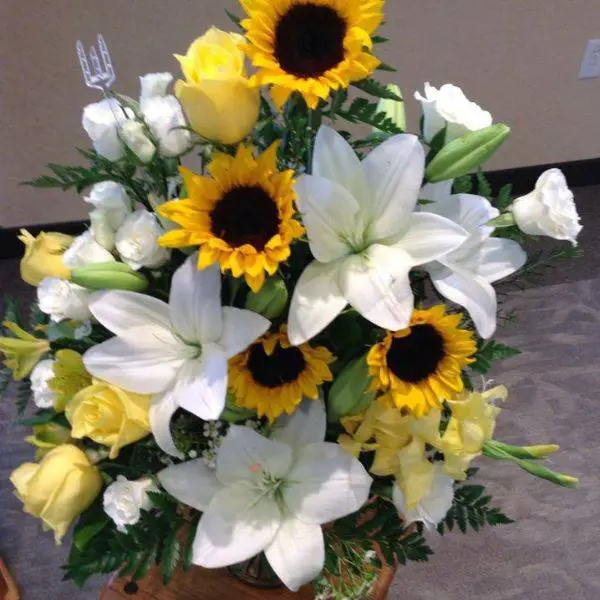  Sunflower and Magnolia Leaf Arrangement